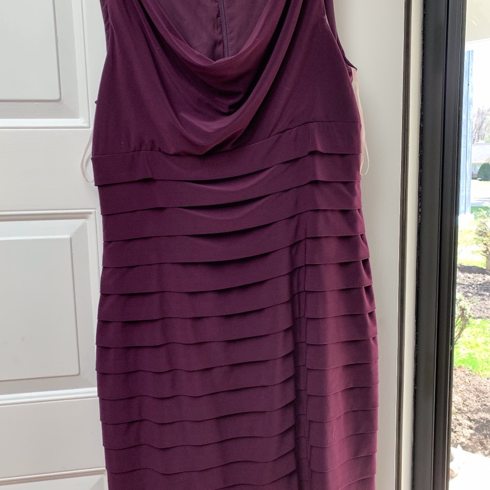 Flattering function dress.  Lined with a kind of n
